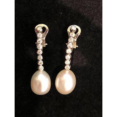 A Pair Of Pearl And Diamond Earrings
