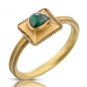 Medieval Gold Ring Set With A Cabochon Emerald. European, 15th Century.
