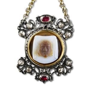 Silver And Gold Pendant With Diamonds, Rubies And A Cameo Of Veronica’s Veil.