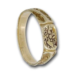 Iconographic Gold Ring Engraved With Saint Catherine. England, 15th Century.