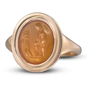 Gold Ring With Roman Carnelian Intaglio Of Eros Before An Altar.