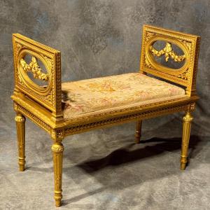 Small Carved Gilded Wooden Bench From The 1900s. Upholstered.