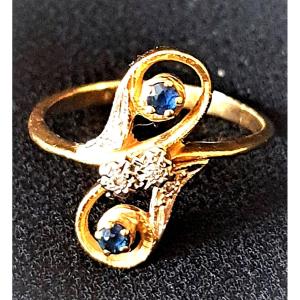 BAGUE TOI & MOI - OR JAUNE - 2 SAPHIRS BLEUS ET PETITES ROSES DE DIAMANT