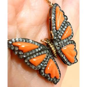 Necklace With  "butterfly" Pendant In Light Orange Coral Surrounded By Small Diamond Cut Roses