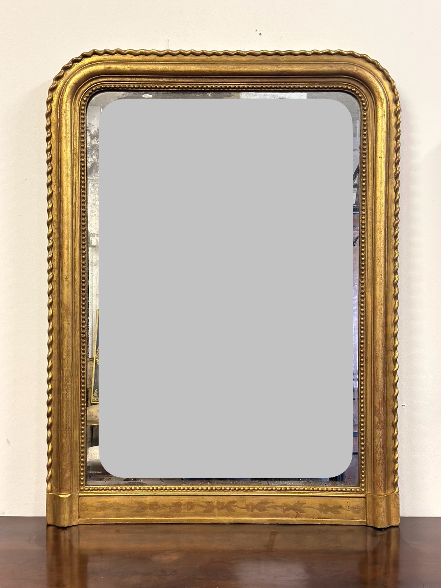 Specchiera in legno intagliato dorato con treccia sui lati XIX secolo