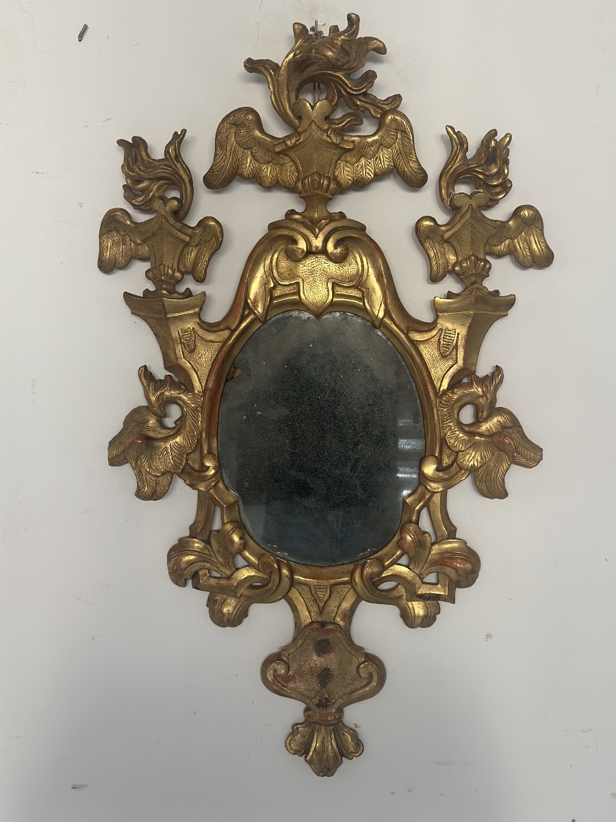 Specchiera a ventola Luigi XV epoca 700 vetro al mercurio dorata a foglia. Firenze Lucca 700. 