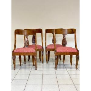 Gruppo di quattro sedie in piuma di noce impero a pozzetto . XIX secolo