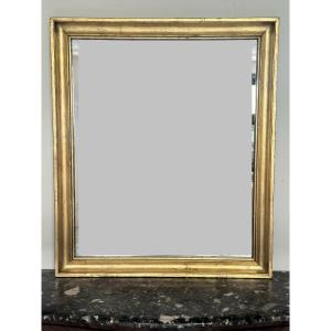 specchiera impero in legno dorato XIXsecolo restaurata