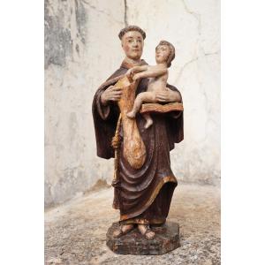 Saint Anthony With The Christ Child, Holding A Bag For Distributing Bread To The Poor