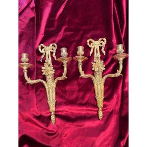 Pair Of Louis XVI Period Sconces In Chased And Gilded Bronze