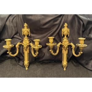 Pair Of Louis XVI Period Two-light Sconces In Chased And Gilt Bronze