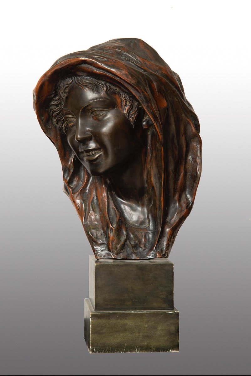 Scultura antica in bronzo brunito raffigurante testa di donna(NINA) firmata Gemito.