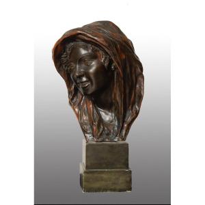 Scultura antica in bronzo brunito raffigurante testa di donna(NINA) firmata Gemito.