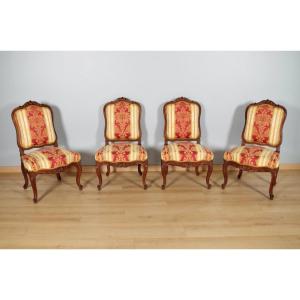 Four Regency Style Walnut Chairs