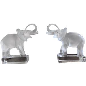 Lalique  Pair Of Elephant Bookends In Molded And Satin-finished Crystal.