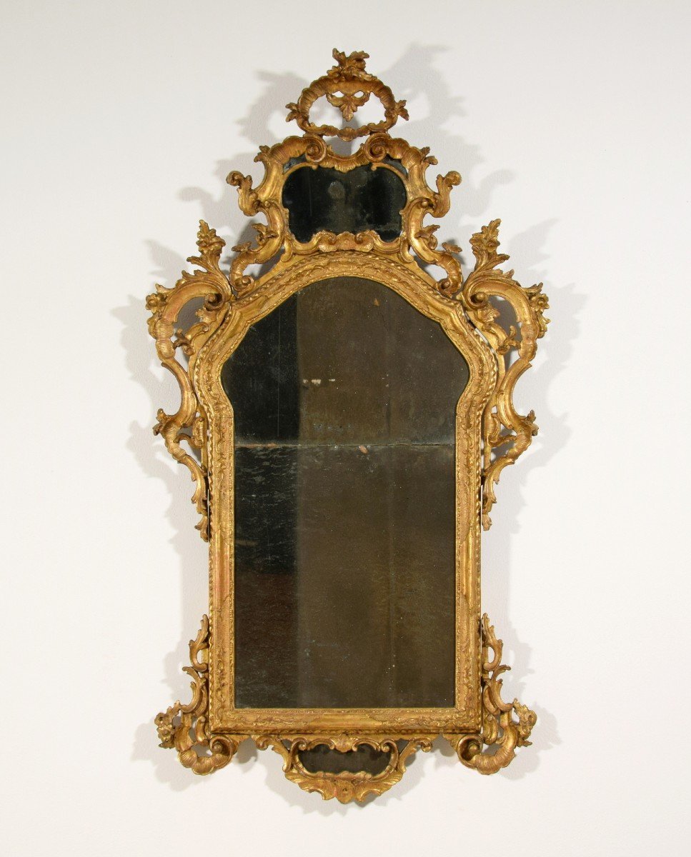 Specchiera in legno intagliato e dorato, Venezia, periodo barocchetto, seconda metà XVIII secolo