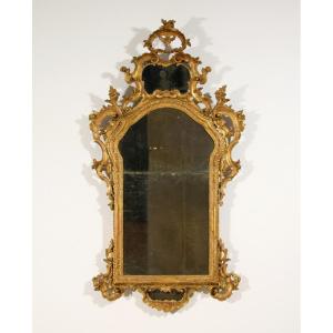 Specchiera in legno intagliato e dorato, Venezia, periodo barocchetto, seconda metà XVIII secolo