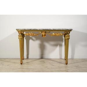 Consolle neoclassica in legno intagliato, laccato e dorato, piano in marmo, Italia, XVIII sec.