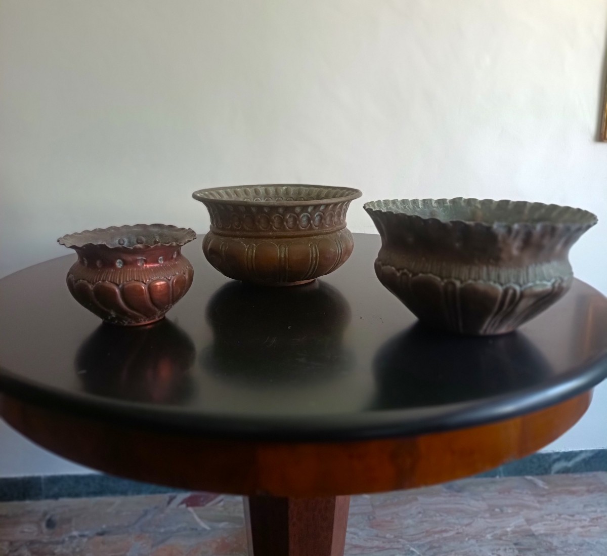 Tre coprivaso in rame 1910