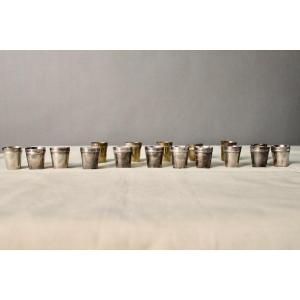 Set Of 17 Silver Metal And Brass Shot Glasses