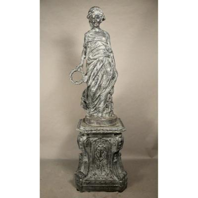 Young Woman Draped In Cast Iron On Base