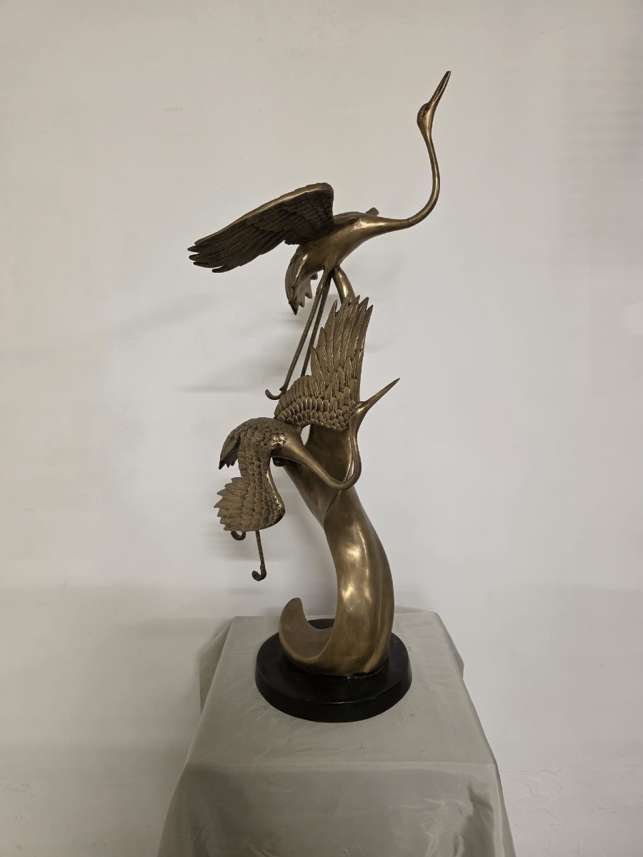scultura in ottone, raffigurante aironi cenerini in volo, anni 40'