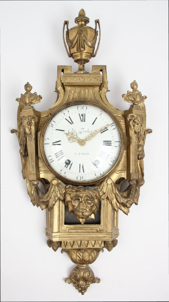 Orologio a cartel, Luigi XVI, in bronzo dorato,  Jean-Charles Delafosse,  XVIII secolo