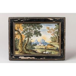 Placca in terracotta, Castelli, XVIII secolo, raff. "Paesaggio con figure e castello"