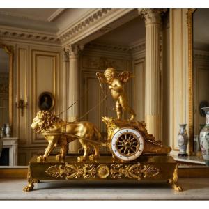 Orologio in bronzo dorato, raff. "Il carro dell'Amore trainato dal Coraggio", Impero, XIX sec