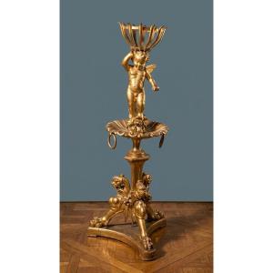 Torciere / Portavaso in legno scolpito e dorato con putto, XIX secolo
