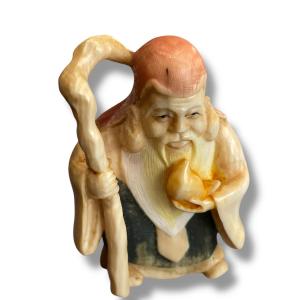 Netsuke Of A Sage Holding A Longevity Peach