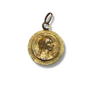 Profile Of The Virgin Mary On A Gold Medal