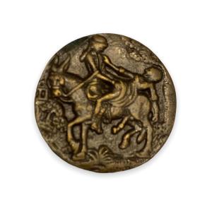 Erotica Medallion In Bronze Representing A Saucy Scene