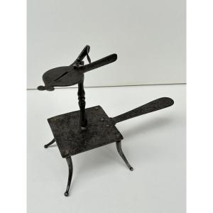 Forbice in ferro forgiato per candela a tempo