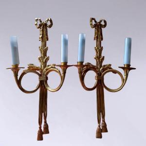 A Pair Of Electrified Bronze Wall Sconces.
