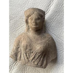 Terracotta Fragment Of A Draped Woman 
