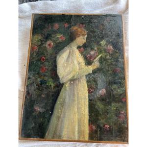 Young Girl Reading In The Flower Garden 