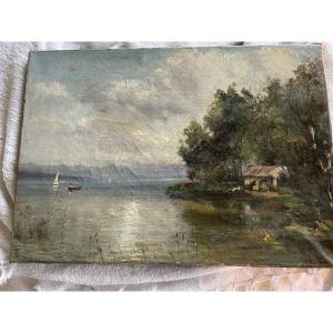 Boats And Sailboats On A Lake 