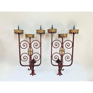 Red And Gold-tinted Wrought-iron Sconces.