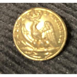 Small, Slightly Domed Button. 