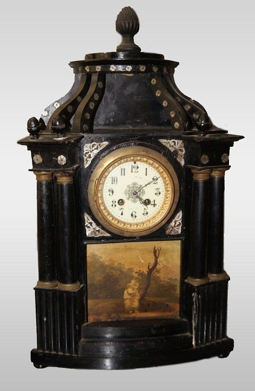 Orologio da tavolo italiano della prima metà del 1800 in legno ebanizzato con applicazioni in m