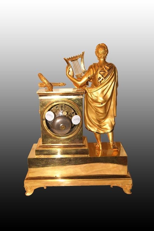 Orologio francese della prima metà del 1800, stile Impero, in bronzo dorato al mercurio-photo-1