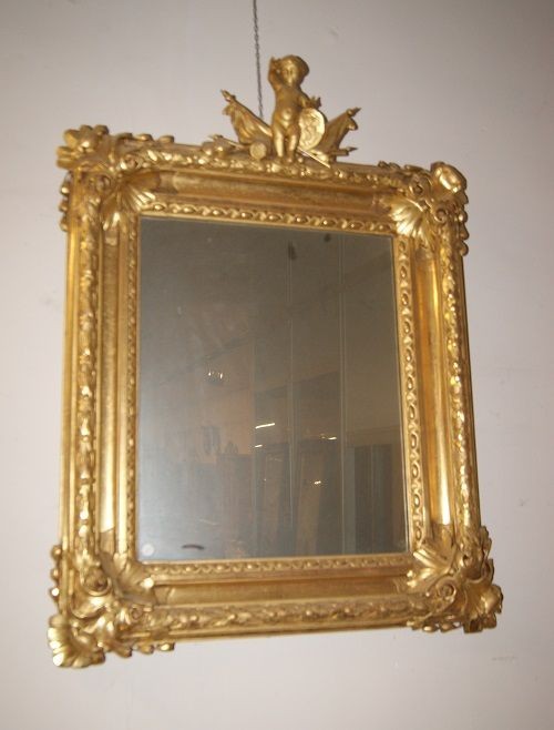 Stupenda specchiera francese della prima metà del 1800, in legno dorato foglia oro