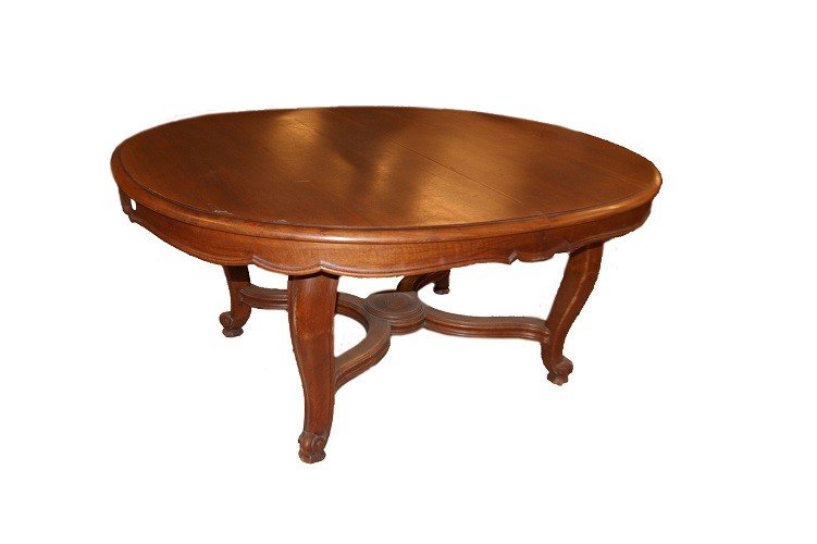 Grande tavolo ovale allungabile del 1800 in legno di noce stile Luigi Filippo 