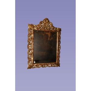 Stupenda specchiera italiana di inizio 1700, stile Luigi XIV, in legno dorato foglia oro