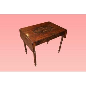 Tavolino con alette francese di metà 1800, stile Carlo X, in legno di noce fiammato