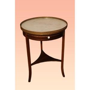 Tavolino circolare francese della seconda metà del 1800, stile Transizione, in legno di mogano