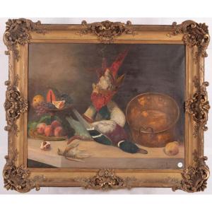 Olio su tela raffigurante natura morta, con cacciagione, frutta e pentola in rame. Cornice coev