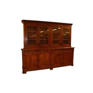 Grande libreria credenza italiana di inizio 1800, stile Luigi Filippo, in legno di noce. Presen