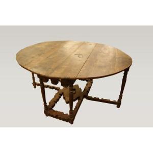Tavolo spagnolo in legno di noce, del 1600 stile Luigi XIV, con alette